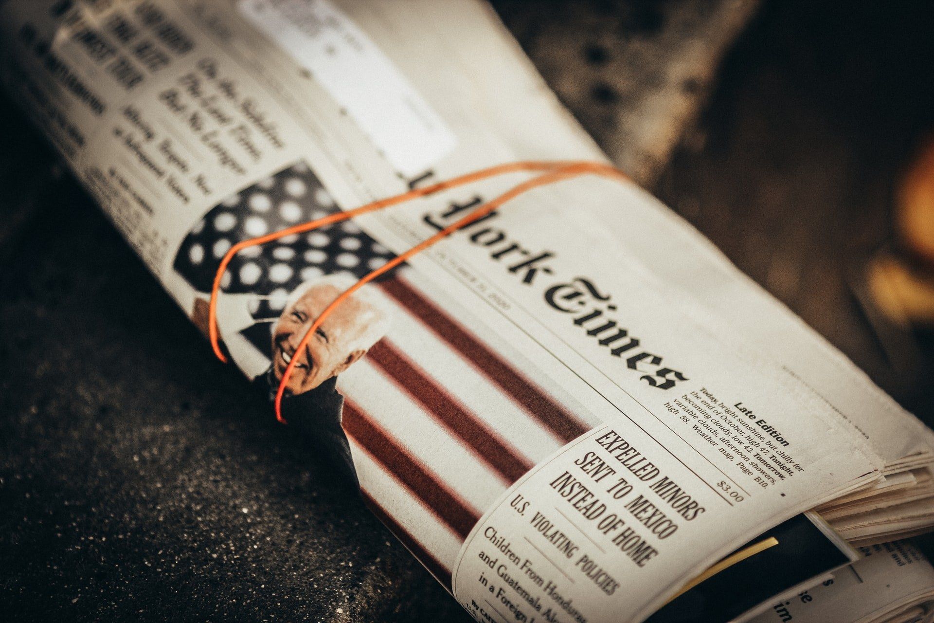 Biden newspaper unsplash